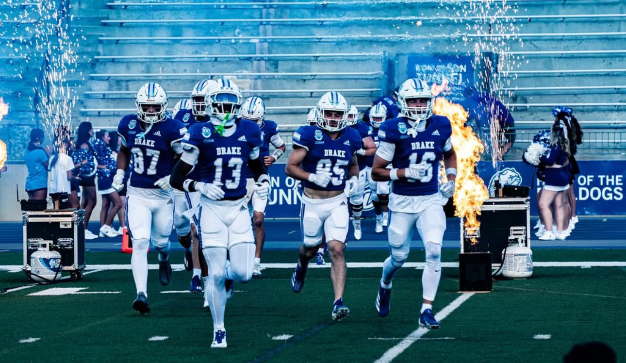 Drake football players running onto the field through the entrance effects