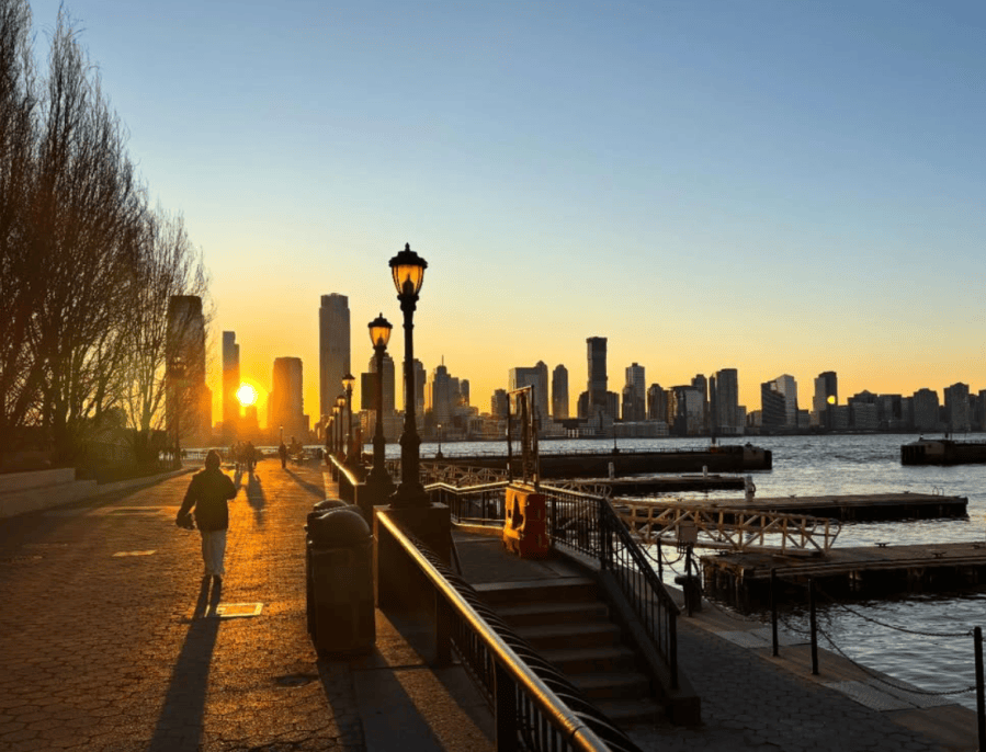 City skyline at sunset beside the waterfront